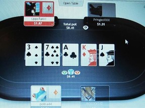 A computer screen in Atlantic City N.J. shows a game of online poker in progress on the global partypoker.com site.