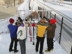 Cross-country skiers lock up their skis at the Century Park LRT Station on January 31, 2015. The City of Edmonton installed the rack to encourage people to ski to the south-side public transit station.