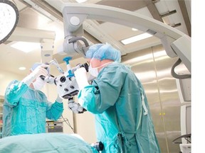 Doctors perform brain surgery in the University of Alberta Hospital’s new Dan and Bunny Widney Intra-operative MRI Suite.
