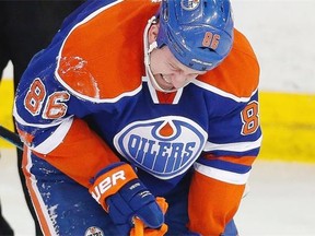 EDMONTON, ALBERTA ; JANUARY 29, 2015-- An injured Edmonton Oilers Nikita Nikitin (86) skates off the ice during the third period against the Buffalo Sabres on January 29, 2015 in Edmonton.(Greg Southam/Edmonton Journal)