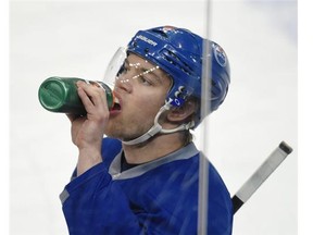 Taylor Hall hydrates during the Edmonton Oilers practise at Rexall Place in Edmonton on Monday Jan. 26, 2015.