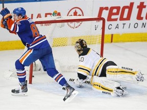 Edmonton Oilers defenceman Martin Marincin scores on Boston Bruins goalie Tuukka Rask for the game-winning goal in the shootout on Feb. 18, 2015, in Edmonton. The Oilers won 5-4.