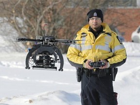 Edmonton police department constable Binoy Prabhu flies a camera mounted drone.