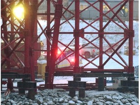 Emergency crews on scene after a worker fell in a hole at the new Walterdale Bridge construction in Edmonton, January 30, 2015.