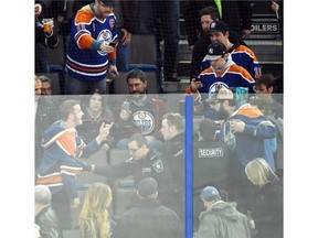 A fight breaks out after a jersey was thrown on the ice as the Edmonton Oilers lose 4-0 to the Minnesota Wild game at Rexall Place in Edmonton on February 20, 2015.