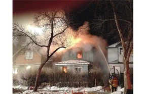 A fire completely destroyed a house at 94th Street and 113 ave in Edmonton on Saturday, Feb. 21, 2015.