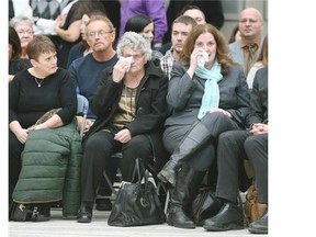 Friends and family get emotional during the Edmonton Police Service graduation ceremony for Recruit Training Class 130 at Edmonton City Hall on Friday Feb. 13, 2015.