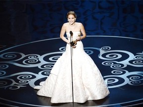 Jennifer Lawrence accepts the best actress award for Silver Linings Playbook in 2013.
