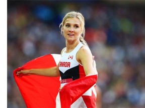 Overall winner Brianne Theisen-Eaton of Canada celebrates after the Women's Heptathlon 800 metres at Hampden Park during day seven of the Glasgow 2014 Commonwealth Games on July 30, 2014 in Glasgow, United Kingdom.