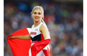 Overall winner Brianne Theisen-Eaton of Canada celebrates after the Women's Heptathlon 800 metres at Hampden Park during day seven of the Glasgow 2014 Commonwealth Games on July 30, 2014 in Glasgow, United Kingdom.