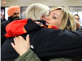 Incumbent Sandra Jansen got a hug from her boyfriend Neil Brown after the results of the PC nomination race for Calgary-North West were read on Feb. 21, 2015. Jansen defeated her opponent Blair Houston to claim the nomination.