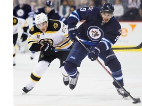 Evander Kane's move to Buffalo shakes things up in a big way for both teams, with the Sabres eyeing a first pick to snag Connor McDavid next year if they win the draft lottery and the Jets hoping to make a playoff push right now.