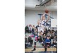 St Joseph Saints Zygmantas Adefuin scores against the Okotoks Holy Trinity Knights during championship action in the 32nd Annual Fr. Michael Troy Basketball Tournament at St. Joseph High School on February 7, 2015 in Edmonton. The Okotoks Holy Trinity Knights won the game.