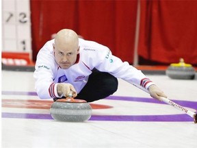 Kevin Koe of Calgary gets low to throw his rock during the round-robin portion of the Boston Pizza Cup Alberta men’s curling championship at the Peace Memorial Multiplex in Wainwright this week.