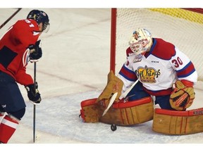 Oil Kings Jarry Tristan makes a save on Lethbridge Hurricanes Mike Whinther at Rexall Place in Edmonton on February 3, 2015.