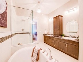 The large ensuite features a separate water closet for privacy.