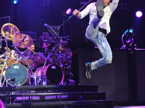 NOVEMBER 27, 2012 - Frontman Arnel Pineda soars at Rexall Place in Edmonton. Photo by: Shaughn Butts/Edmonton Journal.