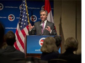 Premier Jim Prentice gestures during his keynote address at the US Chamber of Commerce in Washington, D.C., on Feb. 4, 2015.
