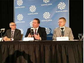 Northlands president Tim Reid (centre) discusses the results of a survey on the future of Rexall Place on Thursday, Feb. 19, 2015. He’s joined by public engagement facilitator Rob Parks (left) and engagement subcommittee chair Mack Male.