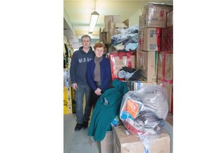 Oleksiy Karpenko, left, and Luba Tsisar, owner of Orbit Ukrainian store, have spent months collecting and shipping clothes, medical equipment and other supplies to people affected by the war in Ukraine.