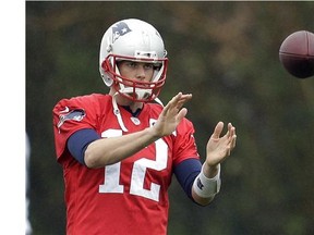 New England Patriots quarterback Tom Brady warms up during practice Friday, Jan. 30, 2015, in Tempe, Ariz. The Patriots play the Seattle Seahawks in NFL football Super Bowl XLIX Sunday, Feb. 1.