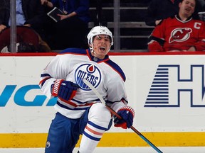 Yakupov up. A bloodied Nail Yakupov celebrates a game-winning goal