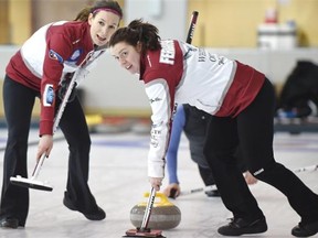 Second Dana Ferguson, right, and lead Rachelle Brown have formed a strong sweeping tandem this season for Val Sweeting’s Alberta women’s curling championship rink, which was practising at the Saville Centre on Feb. 10, 2015.
