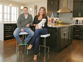 Don Sinclair and Kate Stemler in the kitchen of their home in the southwest Edmonton community of Keswick.