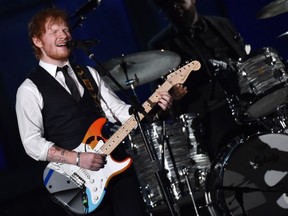 Ed Sheeran performs at the 57th annual Grammy Awards on Sunday, Feb. 8, 2015, in Los Angeles. (Photo by John Shearer/Invision/AP)