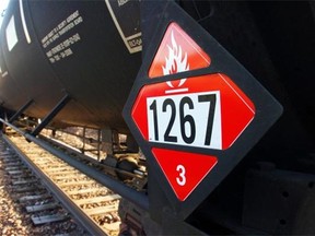 This Nov. 6, 2013 file photo shows a warning placard on a tank car carrying crude oil near a loading terminal in Trenton, N.D.