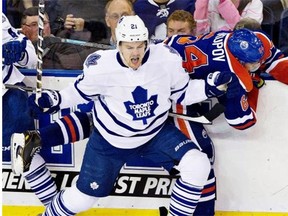 Toronto Maple Leafs winger James van Riemsdyk checks Edmonton Oilers winger Nail Yakupov during the third period of NHL action in Edmonton on Tuesday, Oct. 29, 2013.