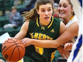 University of Alberta Pandas’ Jessilyn Fairbanks brings the ball upcourt against the Lethbridge Pronghorns in CIS basketball action at the Saville Community Sports Centre on Saturday, Feb. 14, 2015. The Pandas went on to beat the Pronghorns 58-36.