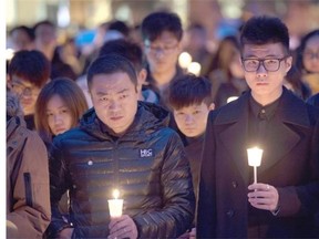 University of Alberta students gather Wednesday for a vigil on campus to remember three international students killed on Monday in car crash. One other student is still in hospital after the single-vehicle rollover on the QEII Highway south of Edmonton.