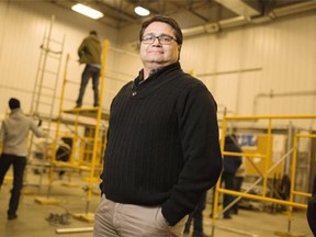 Warren Kootenay, the Aboriginal Initiatives Coordinator at CLAC union, poses for a photo on Feb. 11, 2015 in one of the training areas used to prepare many of his students for the workplace.