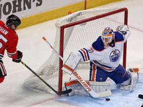 Ben Scrivens slams the door on Andrew Shaw's attempted stuff.