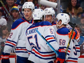 L-R Keith Aulie, Anton Lander, Brandon Davidson and Andrew Miller celebrate BD's first NHL goal in Denver on Monday. All four players started the season in Oklahoma City.