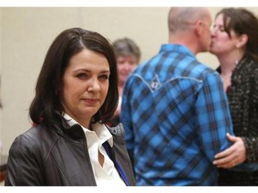 Former Wildrose Party leader Danielle Smith looks on as Okotoks town councillor Carrie Fischer defeats her in the Highwood Progressive Conservative nomination race in High River, Alta. on Saturday, March 28, 2015.THE CANADIAN PRESS/ Jordan Verlage - Okotoks Western Wheel