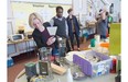 Alberta NDP Leader Rachel Notley went to the annual rummage sale at Robertson Wesley United Church, where she bought $5 worth of scarves.