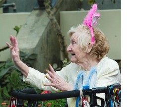 Alma Falardeau, 79, gets into the spirit of things during Easter Egg-stravaganza at the Muttart Conservatory in Edmonton, April 5, 2015. Activities included face painting, Easter crafts and a scavenger hunt.