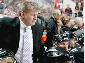 Bill Peters, head coach of the Carolina Hurricanes, during NHL action against the Columbus Blue Jackets at PNC Arena on Nov. 7, 2014, in Raleigh, N.C.