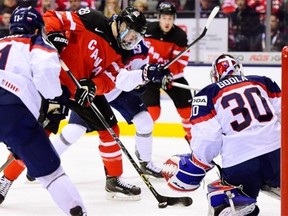 Canada’s Lawson Crouse (28) attempts to get one past Slovakia’s Denis Godla during second period semifinal hockey action at the IIHF World Junior Championship in Toronto on Jan. 4, 2015.