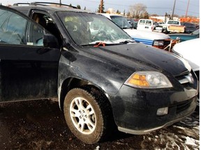 One of the cars seized by seized by Alberta’s civil forfeiture office in 2009, shown in the Edmonton Police Service Tow Lot located at 122 Street and 124 Avenue.