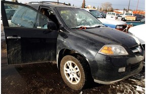 One of the cars seized by seized by Alberta’s civil forfeiture office in 2009, shown in the Edmonton Police Service Tow Lot located at 122 Street and 124 Avenue.