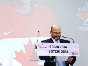 Peter Chiarelli's connection to Bob Nicholson includes being part of Hockey Canada's Olympic selection committee. Here Chiarelli introduces Sidney Crosby as a member of the eventual gold medal winners in Sochi.