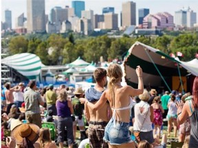 The crowd enjoys a sunny day on the hill at the 2014 Edmonton Folk Music Festival. Organizer Terry Wickham warns this summer’s ticket prices will be a bit higher than in years past.