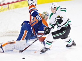 Dallas Stars centre Jason Spezza is stopped by Edmonton Oilers goalie Ben Scrivens (30) during the shootout at Edmonton’s rexall Place on Dec. 21, 2014.