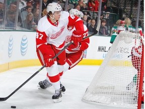 Detroit Red Wings defenceman Alexey Marchenko handles the puck against the Dallas Stars at the American Airlines Center on Jan. 4, 2014 in Dallas.