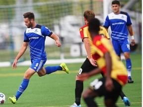 Eddies midfielder Ritchie Jones dribbles the ball during a North American Soccer League game against the Fort Lauderdale Strikers at Clarke Field on Aug. 24, 2014.