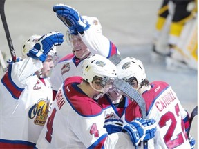 The Edmonton Oil Kings celebrate a goal scored by defenceman Ben Carroll during the second period of Wednesday’s Western Hockey League playoff game against the Brandon Wheat Kings at Rexall Place.