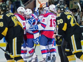 Edmonton Oil Kings celebrate their second goal by #22 Ben Carroll against the Brandon Wheat Kings during the third playoff game in WHL action at Rexall Place in Edmonton, March 30, 2015.